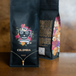 black coffee bag with floral pattern and logo f undergrounds coffee house