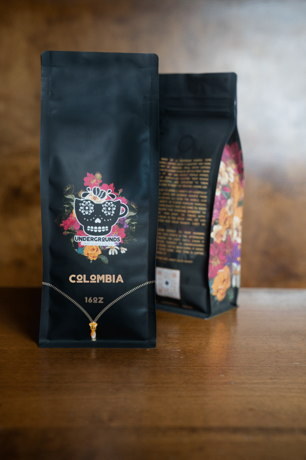black coffee bag with floral pattern and logo f undergrounds coffee house